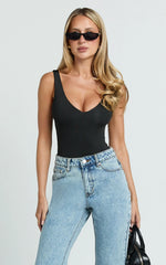 Jacqueline Jeans - High Waisted Relaxed Recycled Denim Bootcut Jeans in Mid Blue Wash