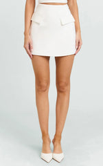 Karlene Mini Skirt - Tulip Shape Pocket Flap Skirt in White
