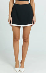 Makenzie Mini Skirt - Contrast Pleat Hem Straight Skirt in Black