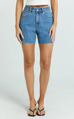 Jacqui Shorts - Mid Rise Frayed Hem Denim Shorts in Light Mid Blue